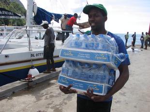 Image #36 - Hurricane Tomas Relief Effort (Carrying the goods to the distribution point)